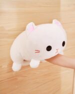 Kawaii milk cat plushie, soft and plush toy with cute features.