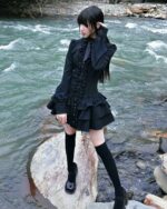 Black laced short dress - Gothic Aesthetic, featuring ruffles and lace, worn outdoors by a river.