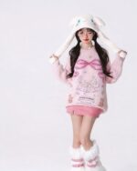 Pink kawaii rabbit sweater with a vintage design, featuring rabbit ears and a cute print.