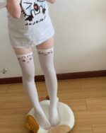 Kawaii Collection kaomoji cute stockings featuring smiling face design.