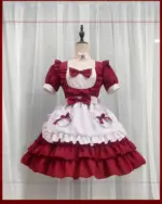 Unisex Japanese maid dress in red and white, featuring ruffles and bows. Kawaii aesthetic.