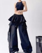 Black y2k cargo pants with ruffled details and lace trim. Wide-leg style.
