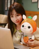 Kawaii bunny plushie, Cotton the Adventurous Rabbit, holding a carrot plushie.