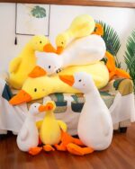 Waddles and Puddles Goose Plush toy collection of yellow and white plush ducks.