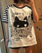 Cute Black & White Tee featuring a goth punk aesthetic with a black cat design and stars.