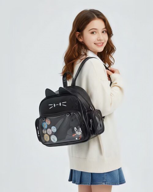 A vegan leather neko bag backpack with cat ears, visible pockets, and decorative pins.