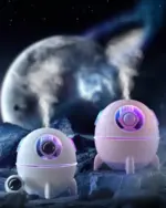 Two kawaii mini spaceship humidifiers resembling astronaut humidifiers on a lunar surface.
