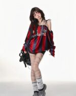 Off Shoulder Sport Sweatshirt - Coquette Aesthetic sweatshirt worn by model, featuring a maroon and gold design.