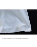 White Japanese-style sleepy cat t-shirt showing the sleeve seam.