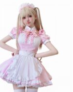 A person wearing a pink maid costume - Kawaii Aesthetic, featuring a frilly dress and headband.