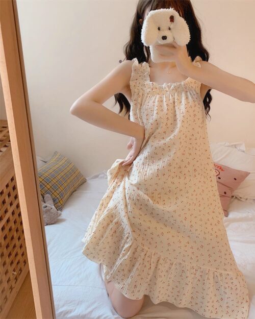 Cream-colored kawaii princess pajamas with floral print, spaghetti straps, and a gathered skirt.
