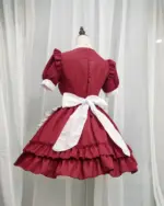 Unisex Japanese maid dress in maroon with white accents and frills.