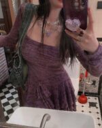 Purple lace gothic aesthetic dress with long sleeves and a square neckline.