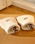 Two kawaii cat beds for cats, providing cozy and comfortable sleeping spaces.