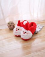 Festive santa cotton slippers with a red hat and white trim, perfect for Christmas.