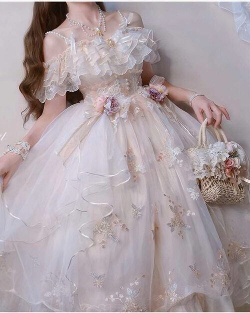 Close-up of a floral lolita dress featuring ruffles, lace, and floral embellishments.