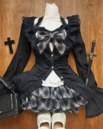 Black kawaii bowed outfits preppy style, featuring a blouse, skirt, and jacket with lace details.
