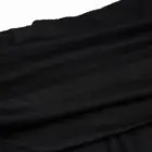 Close-up of black fabric, gothic aesthetic dress material.