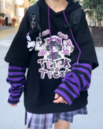 Black Kawaii Cartoon Hoodie featuring a 'Trick or Treat' design and striped sleeves.