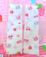 Bunny Strawberry Socks and Sleeves featuring strawberries and bunnies on a pink background.