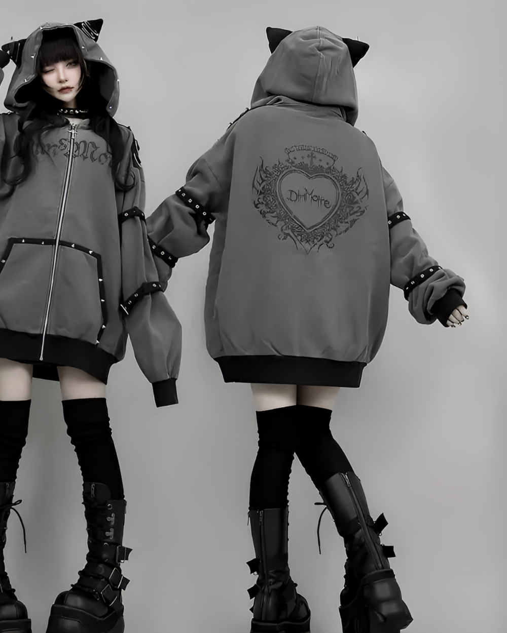 Dark Cat Hoodie featuring a gray zip-up design with cat ears and an embroidered graphic.