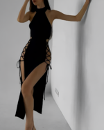 Black Nu-Goth Aesthetic Dress: Long, high-neck gown with side slits and lacing details.