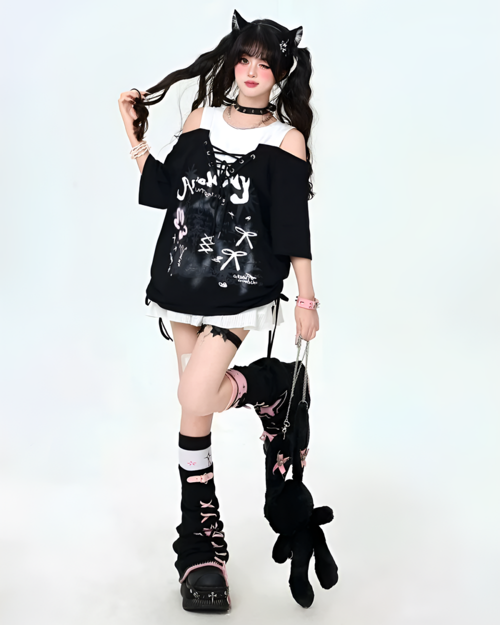 Model wearing a Grunge Aesthetic Top with layered accents and cat ears, paired with matching boots and accessories.