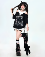 Model wearing a Grunge Aesthetic Top with layered accents and cat ears, paired with matching boots and accessories.