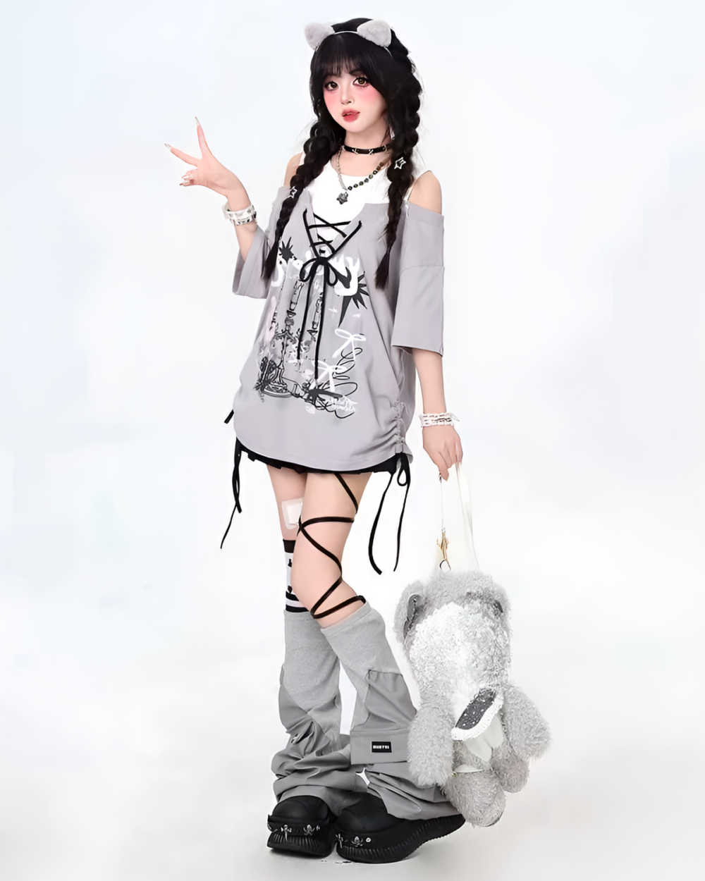 Model wearing a Grunge Aesthetic Top, featuring a layered t-shirt and layered necklaces.