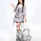 Model wearing a Grunge Aesthetic Top, featuring a layered t-shirt and layered necklaces.