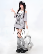 Model wearing a Grunge Aesthetic Top, featuring a layered t-shirt and layered necklaces.