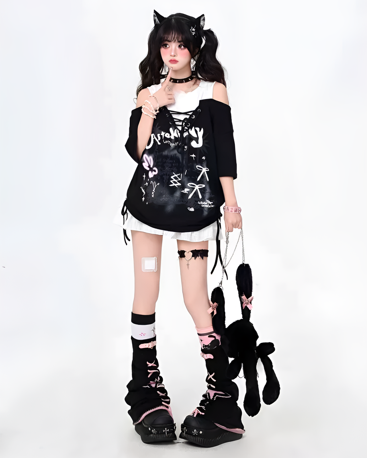 Model wearing a Grunge Aesthetic Top with layered accessories and platform boots.