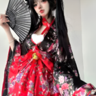 Floral Short Yukata featuring a vibrant floral print with red and purple accents, worn by a model.