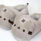 Gray Fluffly Pusheen slippers featuring a cute cat face design and soft interior.