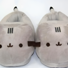 Fluffly Pusheen Slippers, gray plush slippers featuring Pusheen's face.