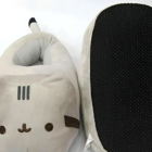Grey Fluffly Pusheen slippers with a non-slip sole. Cute and cozy footwear.