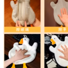 Cute Goose Hand Towel displaying a hand holding a glass.