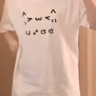 White Kaomoji Cat T-Shirt with cute emoji design.
