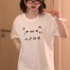 White Kaomoji Cat T-Shirt featuring cute cat design.