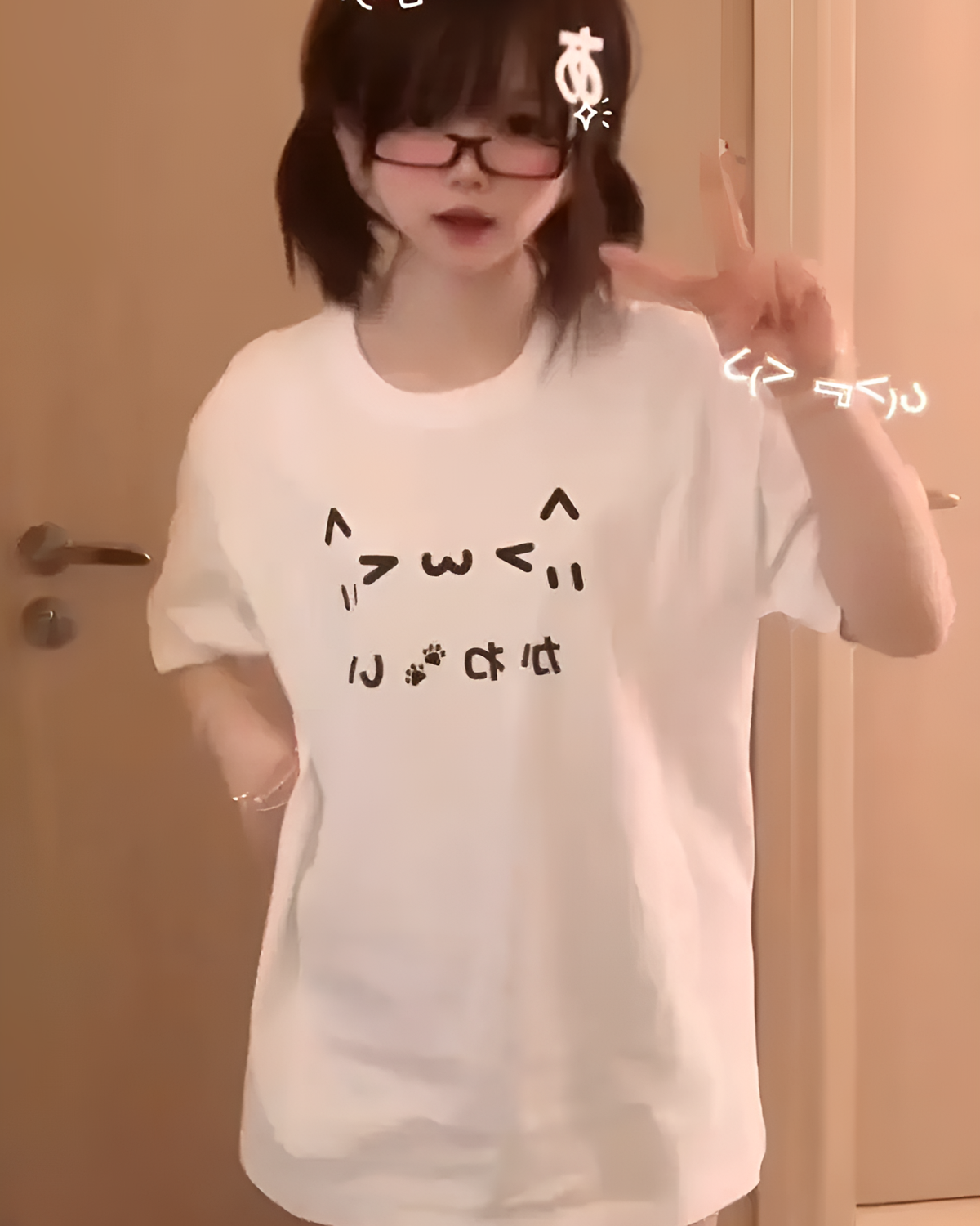 White Kaomoji Cat T-Shirt featuring cute cat design.