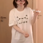 White Kaomoji Cat T-Shirt featuring a cute kawaii design.
