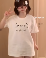 White Kaomoji Cat T-Shirt featuring a cute cat face design.