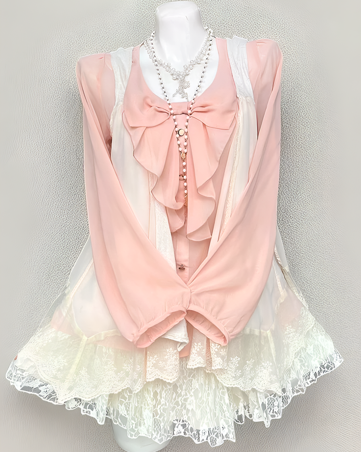 Long Sleeves Pink Set - Dollette Aesthetic featuring a layered blouse and lace skirt on a mannequin.