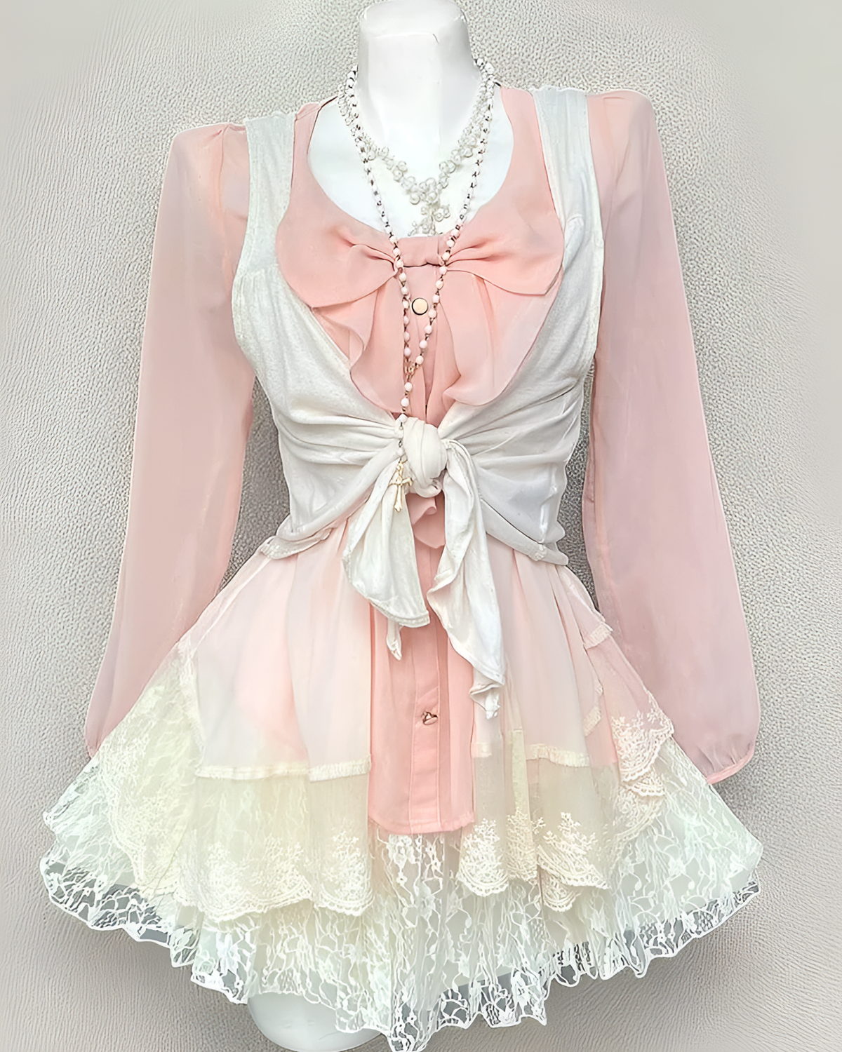 Dollette Aesthetic Set: Pink long sleeve blouse and lace skirt layered with a sheer white top.