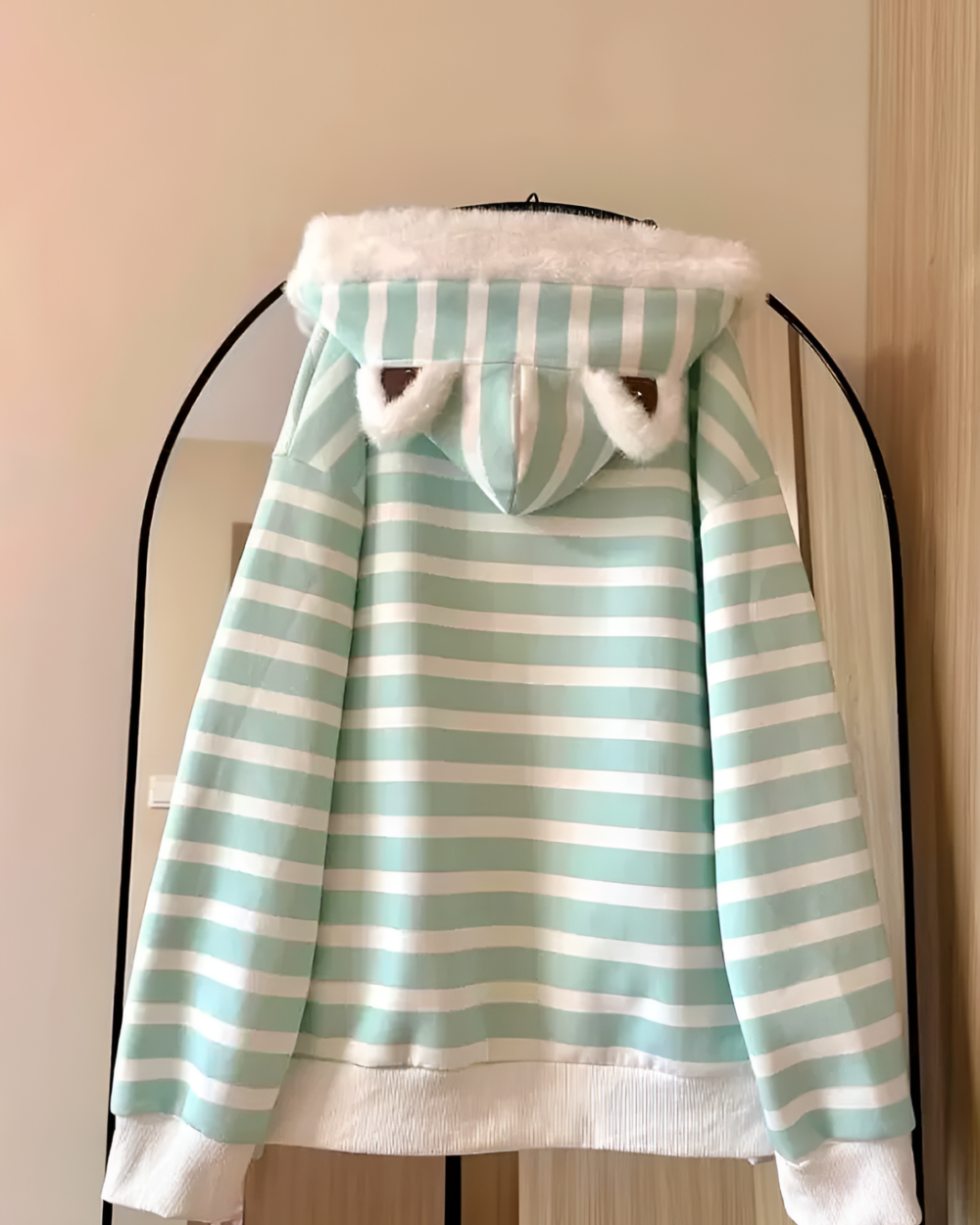 Mint Furry Hoodie, light green striped with white faux fur ears on the hood.