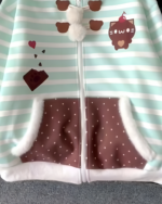 Mint Furry Hoodie featuring a mint green striped design with chocolate and cat illustrations.