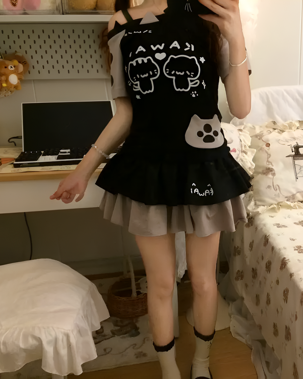 Black Cutecore Aesthetic Top with kawaii cat design, layered with a skirt.