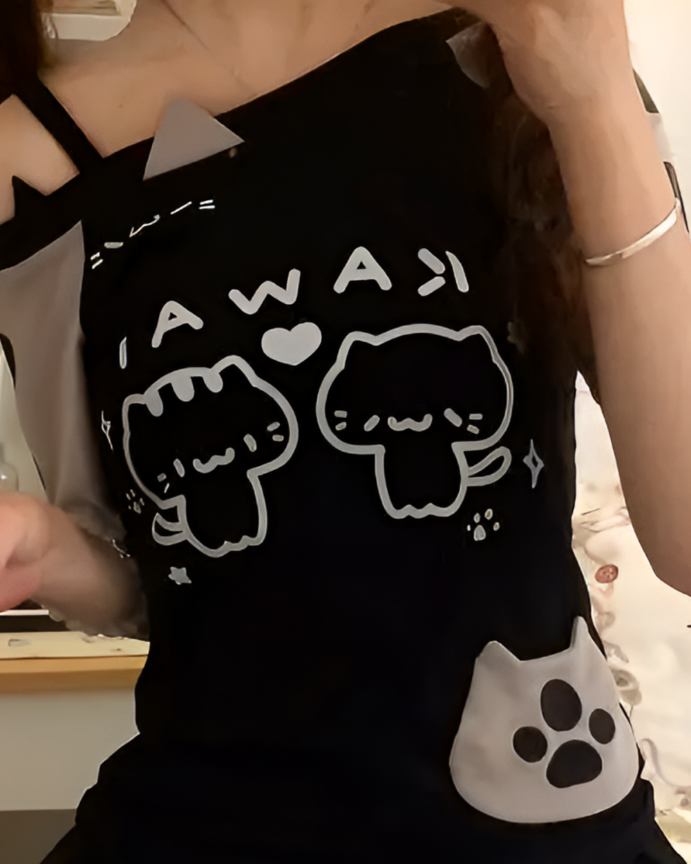 Black Cutecore Aesthetic Top featuring kawaii cat illustrations and paw print details.