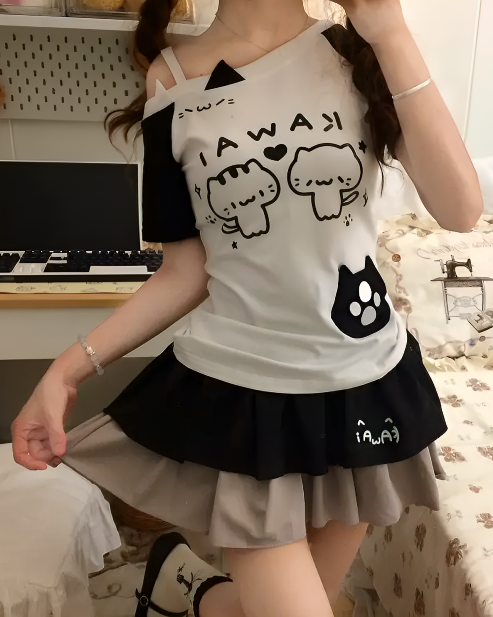 White Cutecore Aesthetic Top with black cat and mouse print, paired with a black ruffled skirt.