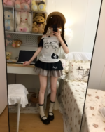 Neko Pair Kawaii Top - Cutecore Aesthetic Top, featuring a cat design, worn by a person in a bedroom setting.